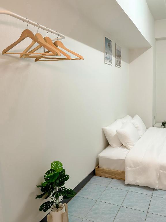 Postel nebo postele na pokoji v ubytování MONTANA Hotel & Hostel Phuket