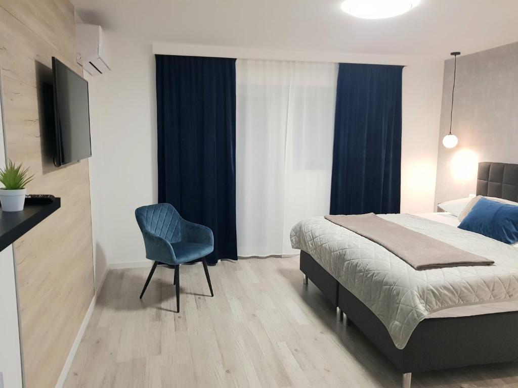 Posteľ alebo postele v izbe v ubytovaní Rooms Vanteo