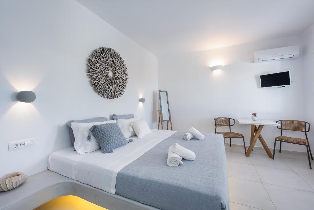 Łóżko lub łóżka w pokoju w obiekcie iL Fagiolo Suites
