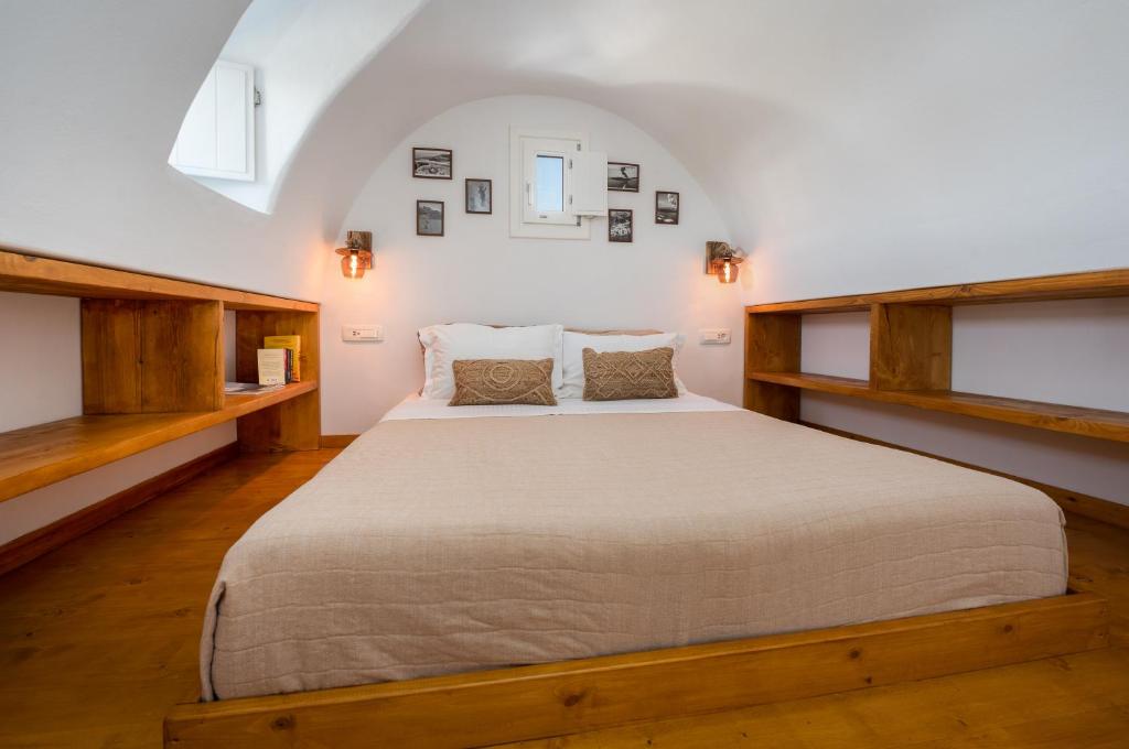 Łóżko lub łóżka w pokoju w obiekcie iL Fagiolo Suites