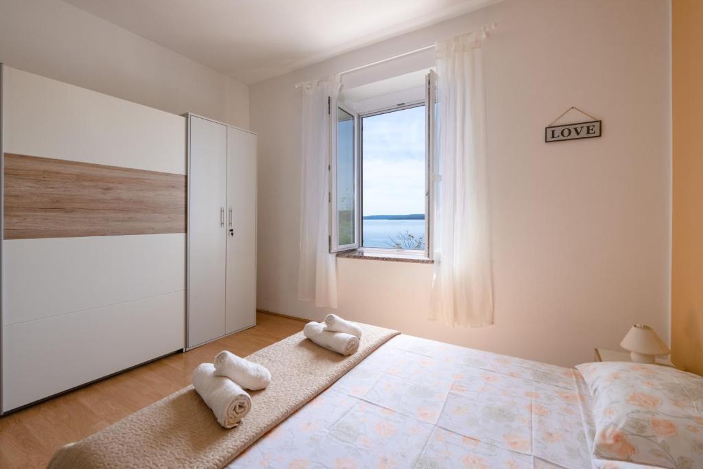 Posteľ alebo postele v izbe v ubytovaní Apartment Dobrić