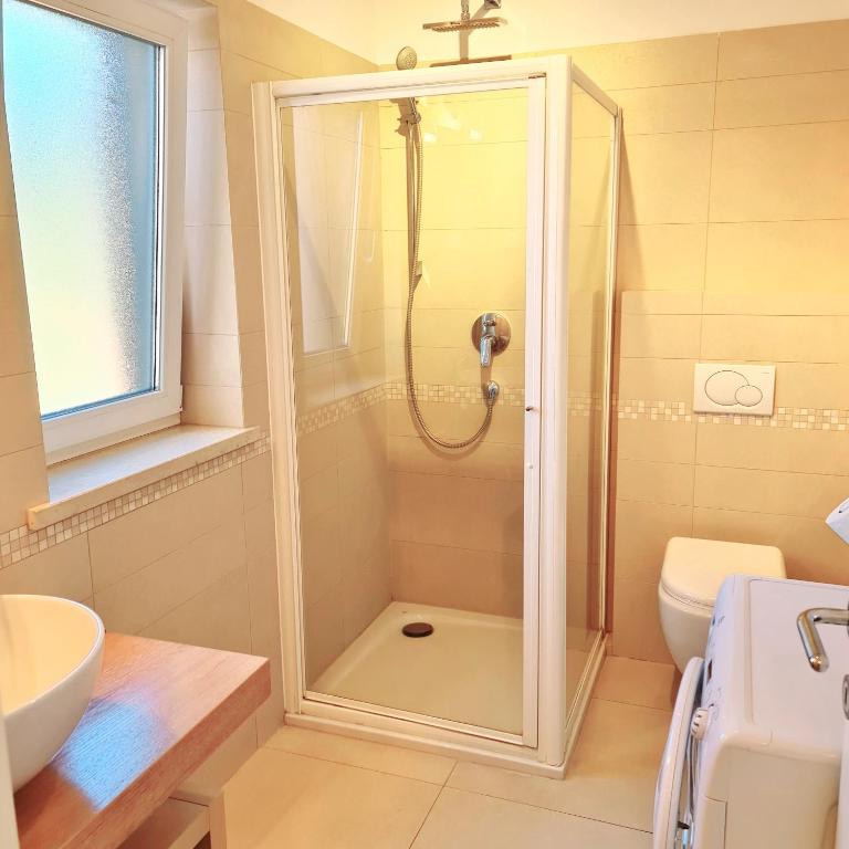 Kúpeľňa v ubytovaní Apartmani Val