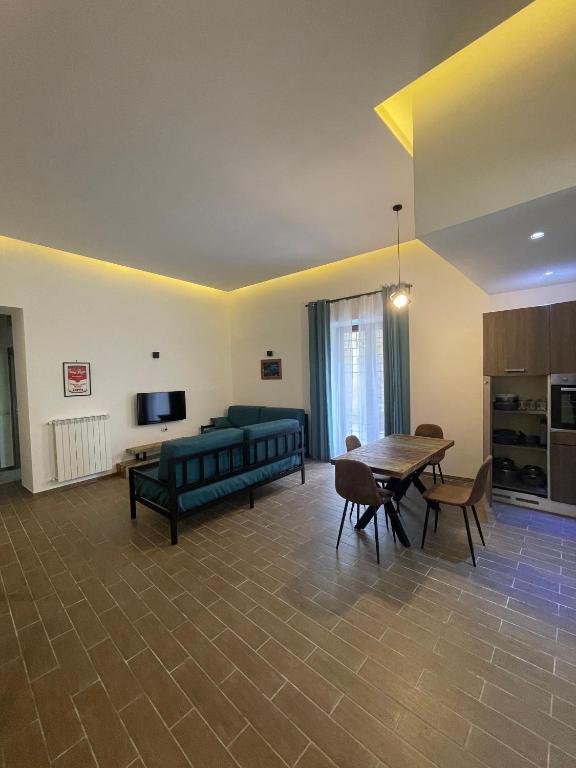 TV a/nebo společenská místnost v ubytování Maison Mercurio Baia Bacoli