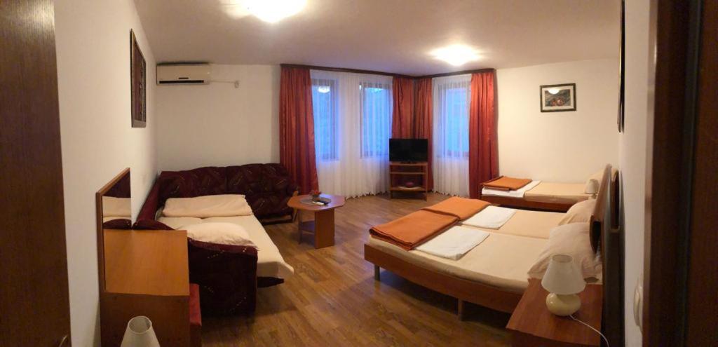 Postel nebo postele na pokoji v ubytování Apartments Stari most