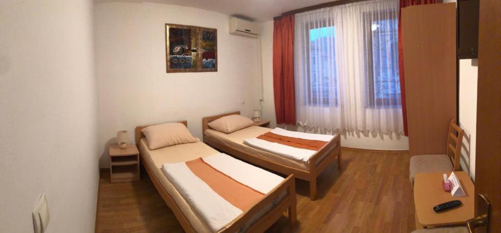 Postel nebo postele na pokoji v ubytování Apartments Stari most