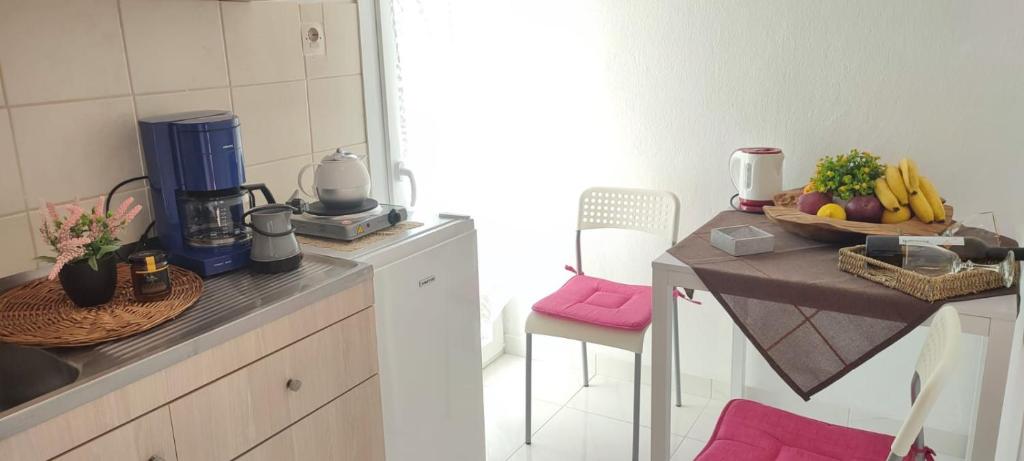Kuchyň nebo kuchyňský kout v ubytování Little Hause