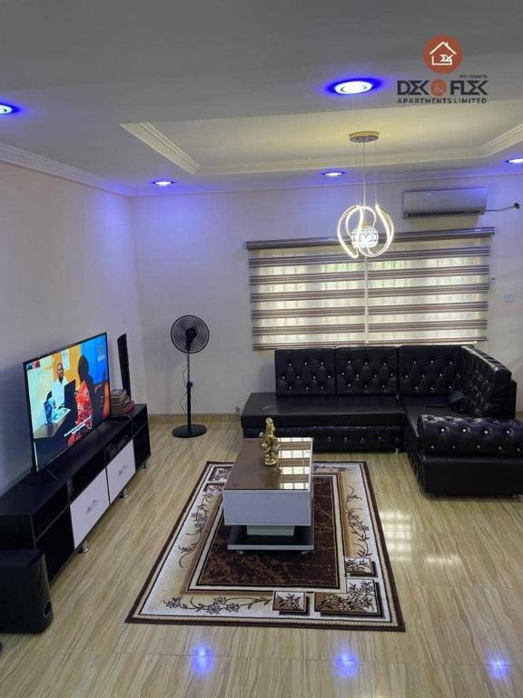 TV a/nebo společenská místnost v ubytování Dex & Flex Apartments