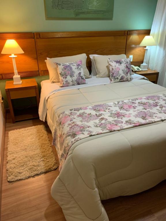 Ліжко або ліжка в номері EXECUTIVE SUITE 106a VILA OLIMPIA