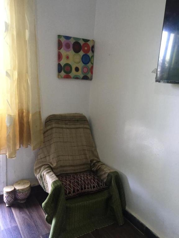 Posezení v ubytování Chambre du jardin