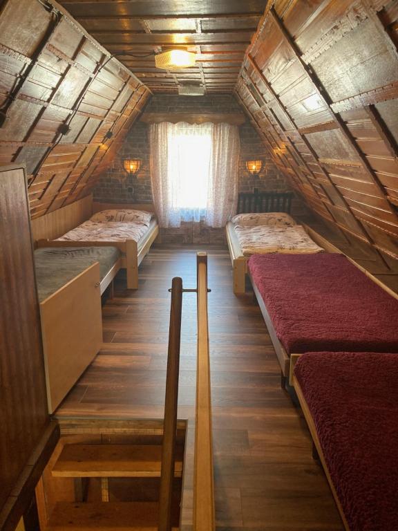 Postel nebo postele na pokoji v ubytování Útulná chaloupka na Valašsku