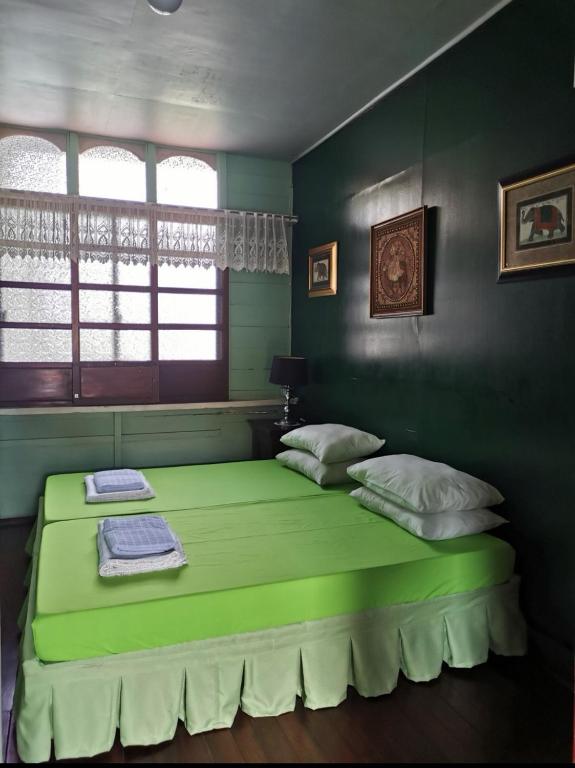 Postel nebo postele na pokoji v ubytování CASA CONCHITA BED & BREAKFAST