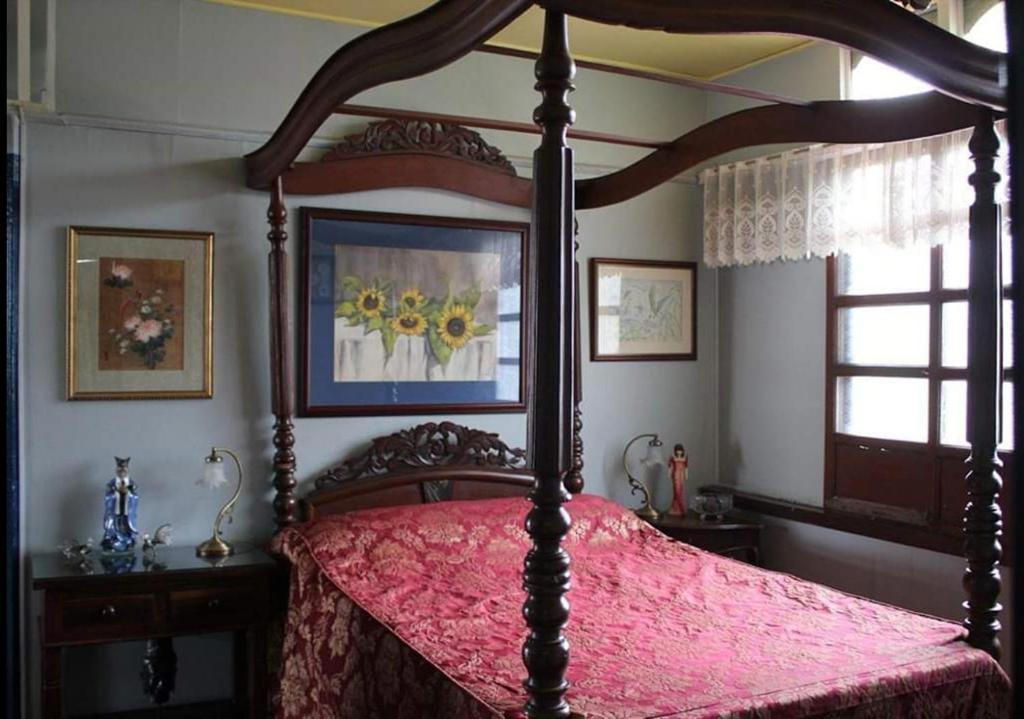 Postel nebo postele na pokoji v ubytování CASA CONCHITA BED & BREAKFAST