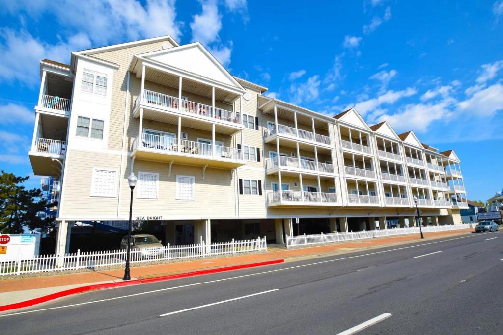 a large white apartment building on the side of a street at Sea Bright 205 condo in Ocean City