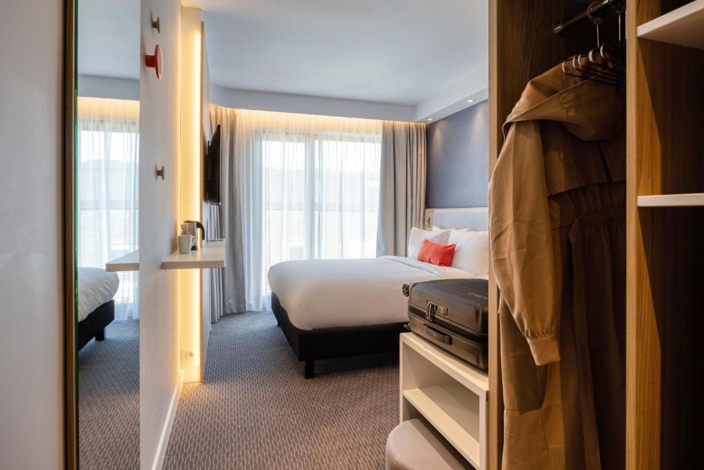 Postel nebo postele na pokoji v ubytování Holiday Inn Express Antwerp - City Centre by IHG