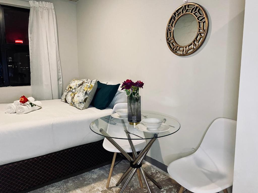 En eller flere senge i et værelse på Views from The 509