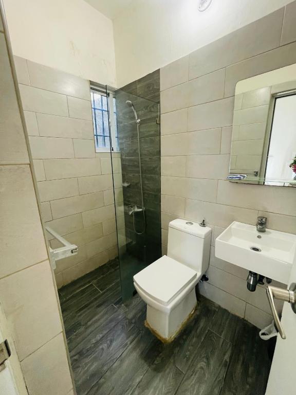 Koupelna v ubytování Tavalero Rooms