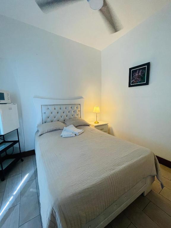 Postel nebo postele na pokoji v ubytování Tavalero Rooms