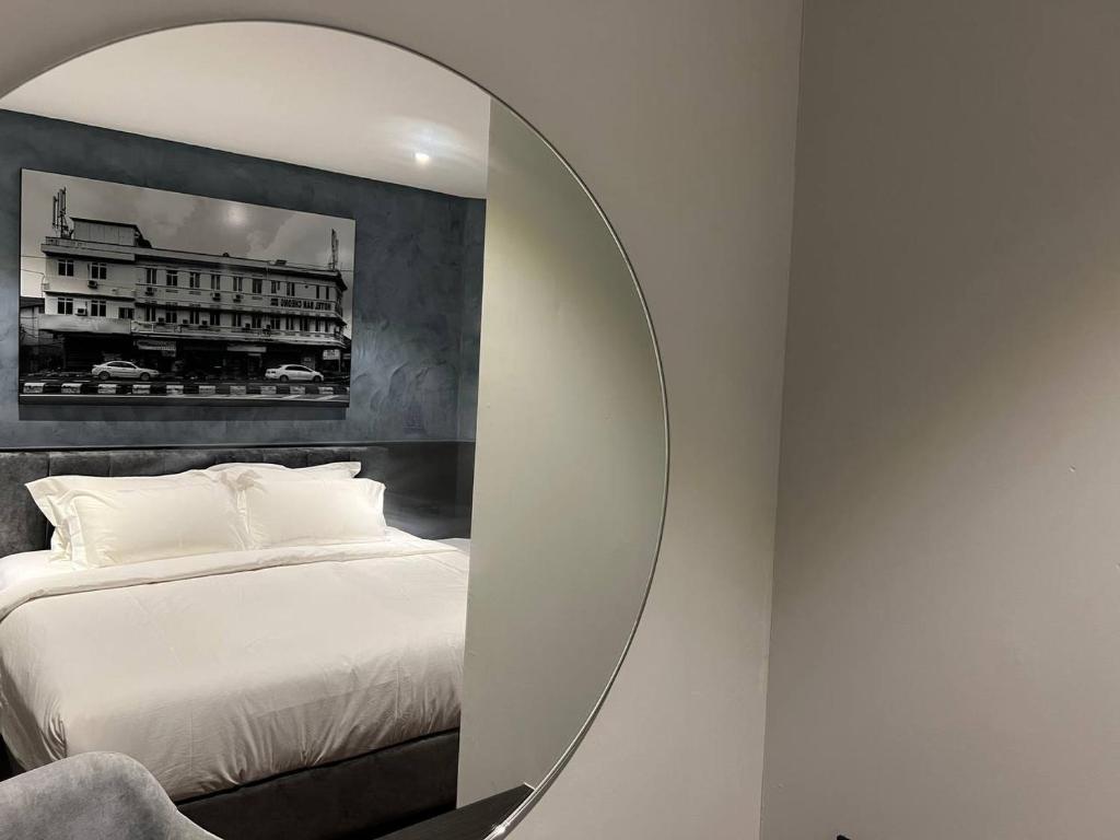 Postel nebo postele na pokoji v ubytování ALL IN HOTEL