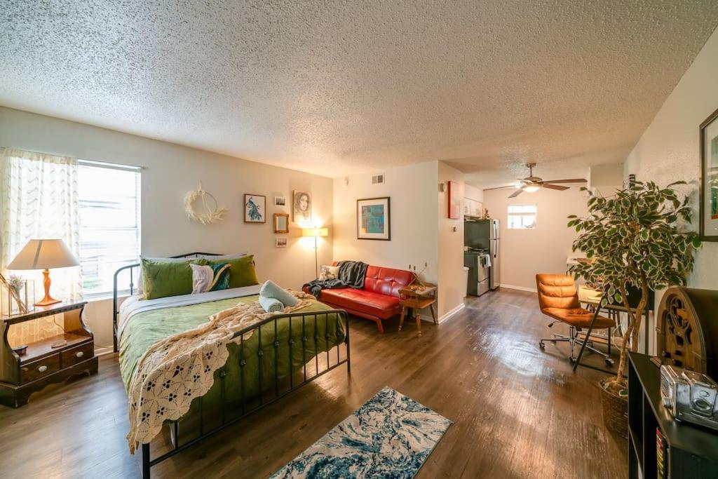 a bedroom with a bed and a living room at The Joplin House - Austin - Zilker Park Studio in Austin