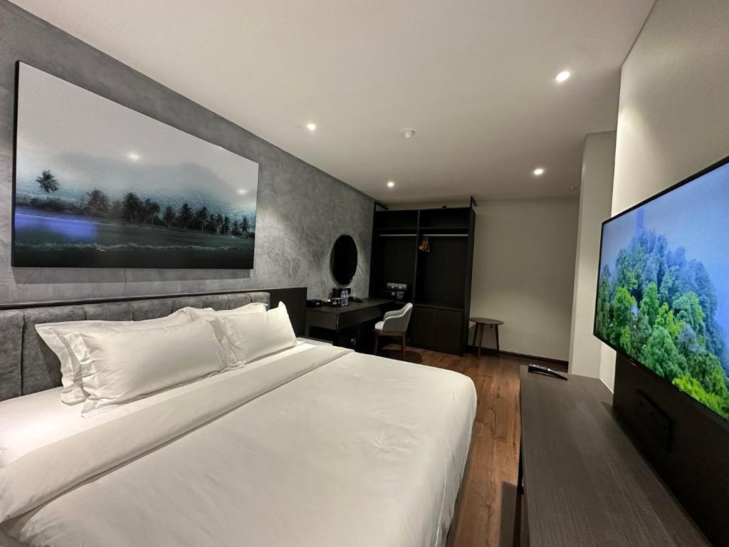 Postel nebo postele na pokoji v ubytování ALL IN HOTEL