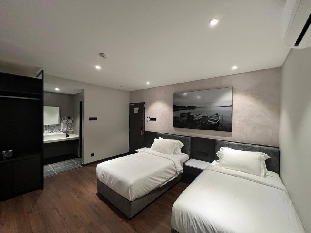 Postel nebo postele na pokoji v ubytování ALL IN HOTEL