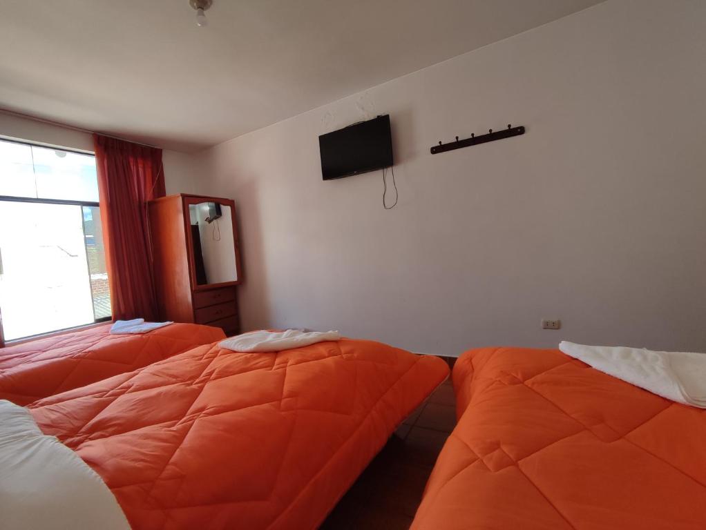 Postel nebo postele na pokoji v ubytování Sunrise Guest House
