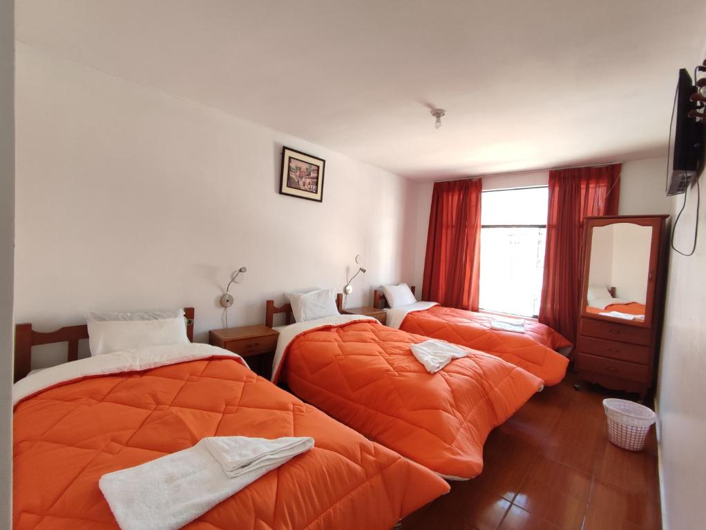Postel nebo postele na pokoji v ubytování Sunrise Guest House
