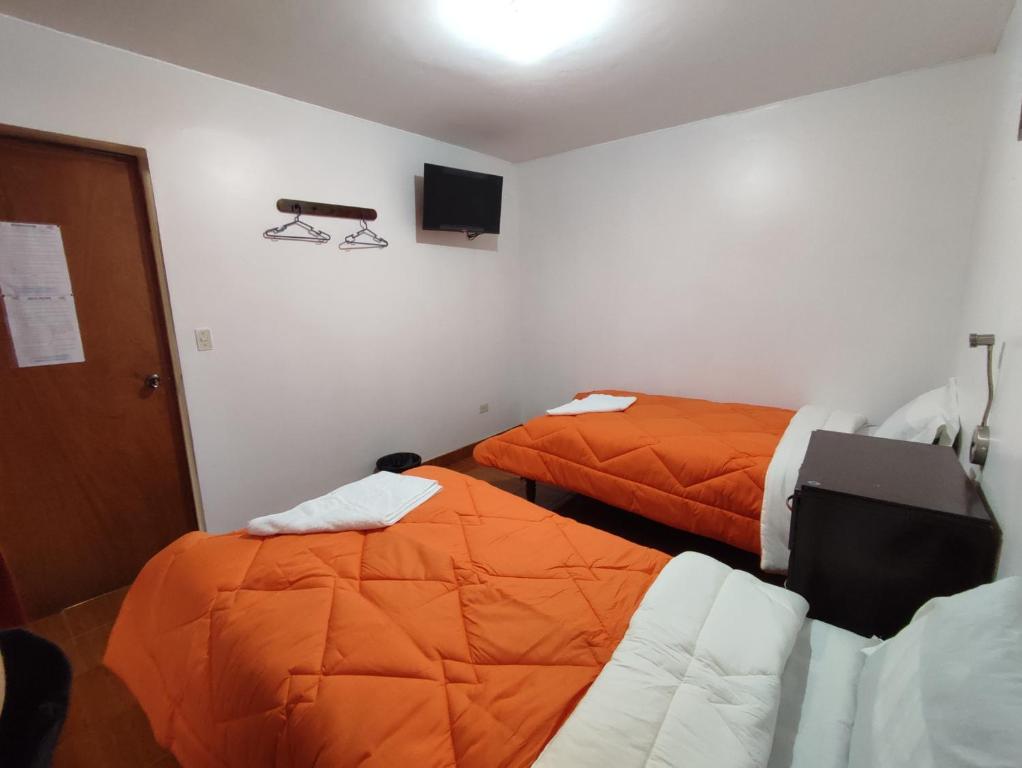 Postel nebo postele na pokoji v ubytování Sunrise Guest House