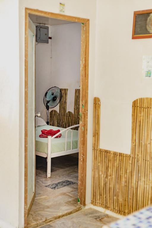 Postel nebo postele na pokoji v ubytování Puerto Galera Hostel