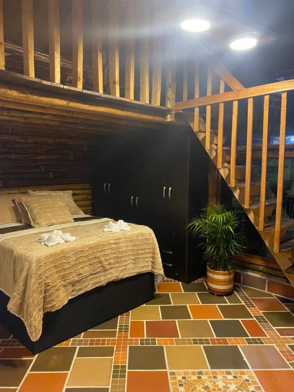 Voodi või voodid majutusasutuse Chalet del lago Santa Elena toas