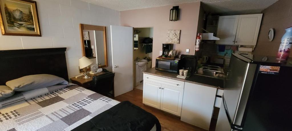 Kuchyň nebo kuchyňský kout v ubytování Southview Motel