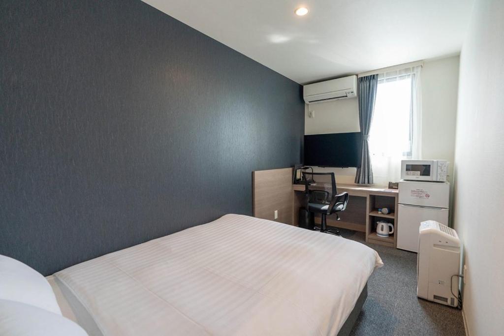 TV a/nebo společenská místnost v ubytování HOTEL R9 The Yard Yuki