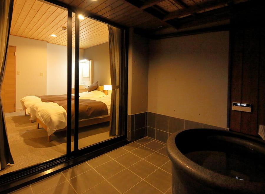 Postel nebo postele na pokoji v ubytování Nishiizu Glamping Tenkuuterrace
