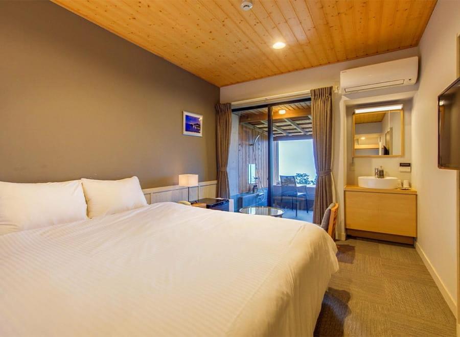Postel nebo postele na pokoji v ubytování Nishiizu Glamping Tenkuuterrace