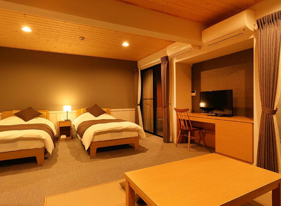 Postel nebo postele na pokoji v ubytování Nishiizu Glamping Tenkuuterrace