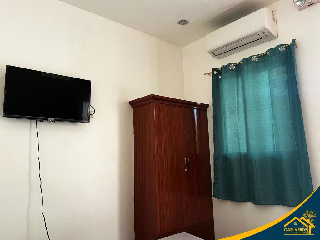 TV a/nebo společenská místnost v ubytování Casi Verde Guest House