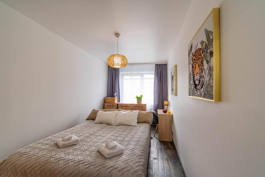 Postel nebo postele na pokoji v ubytování Apartments24 Laada 4