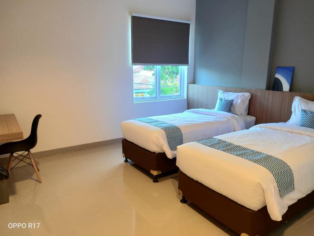 The Holiday Guest House, Tanjung Pandan - Harga Terbaru 2024