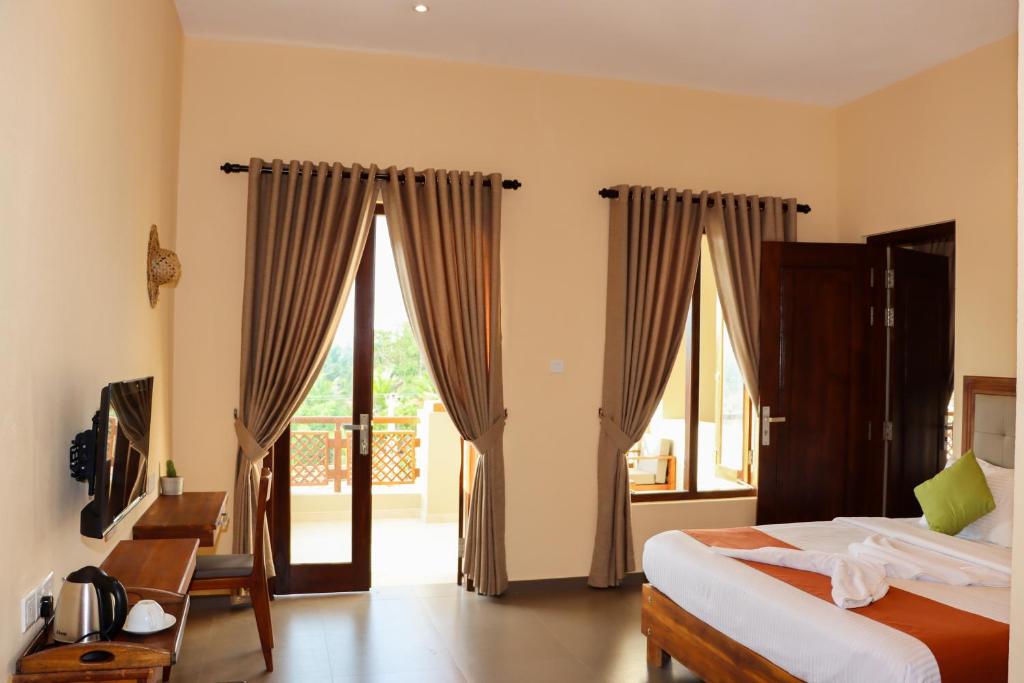 Postel nebo postele na pokoji v ubytování Paddyway Resort