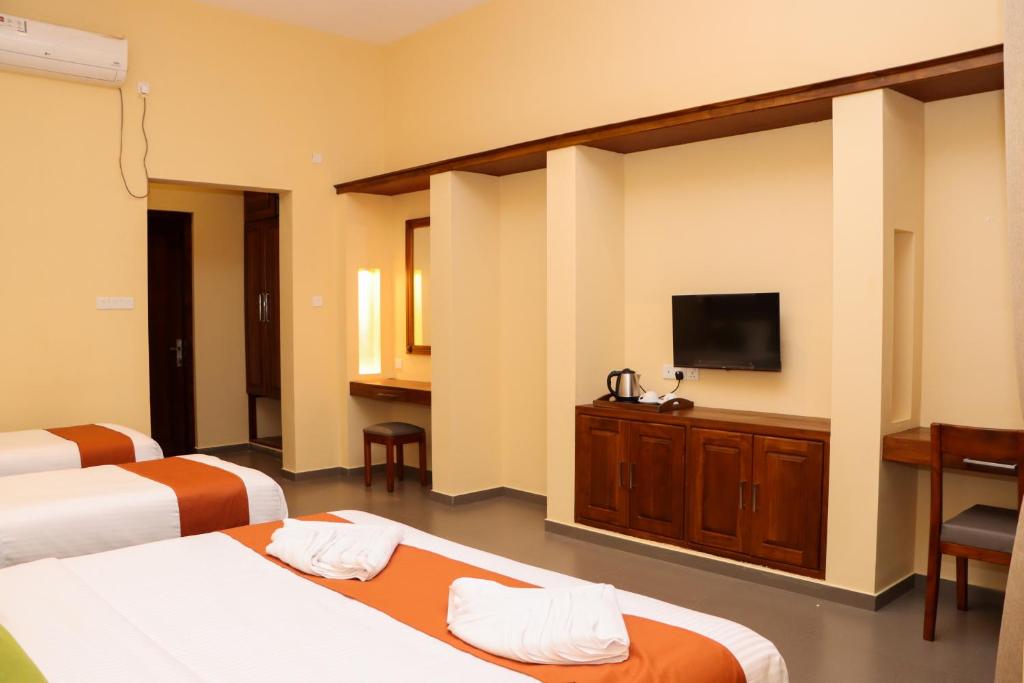 Postel nebo postele na pokoji v ubytování Paddyway Resort