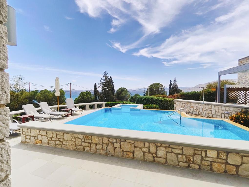 The swimming pool at or close to Villa CostaMare - enjoy lazy days on the private Pool-Jacuzzi