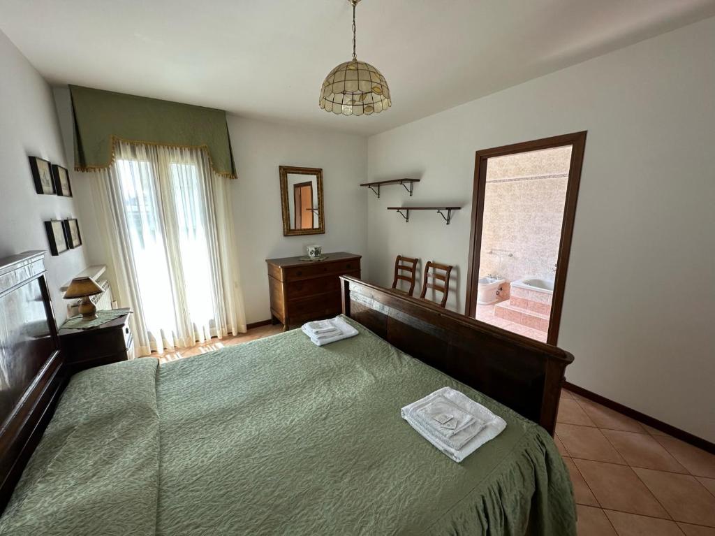 A Villa Esperia Bed and Breakfast tesisinde bir odada yatak veya yataklar