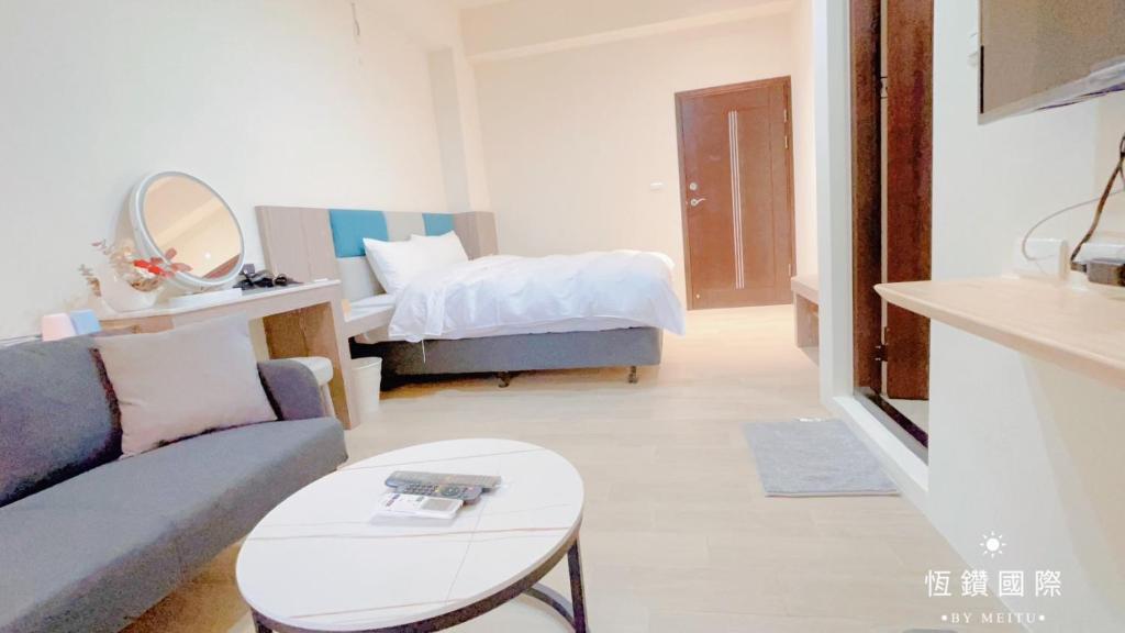 Postel nebo postele na pokoji v ubytování Happy Dragon Homestay