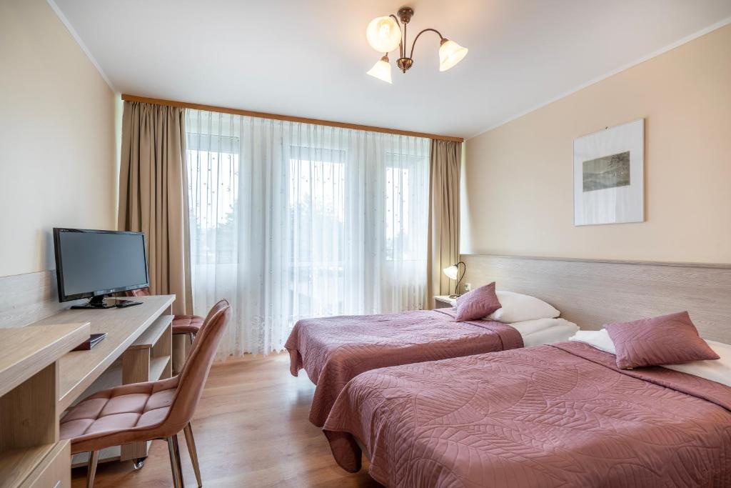 TV a/nebo společenská místnost v ubytování Lech Resort & Spa