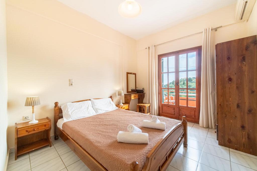 Posteľ alebo postele v izbe v ubytovaní Arianna apartment 11