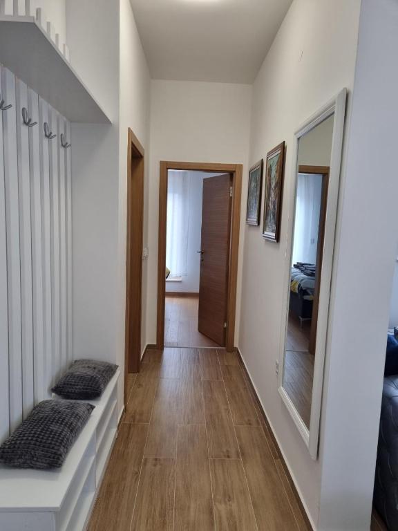 Ein Bett oder Betten in einem Zimmer der Unterkunft Apartman Suzi