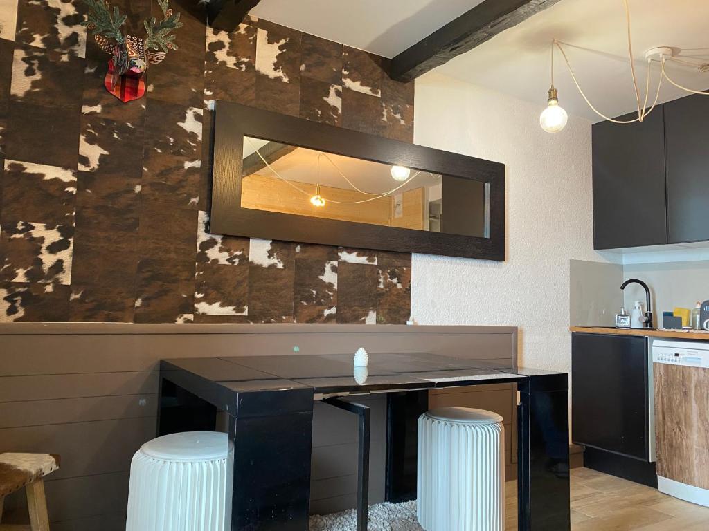 Kuchnia lub aneks kuchenny w obiekcie Antarès Location Avoriaz