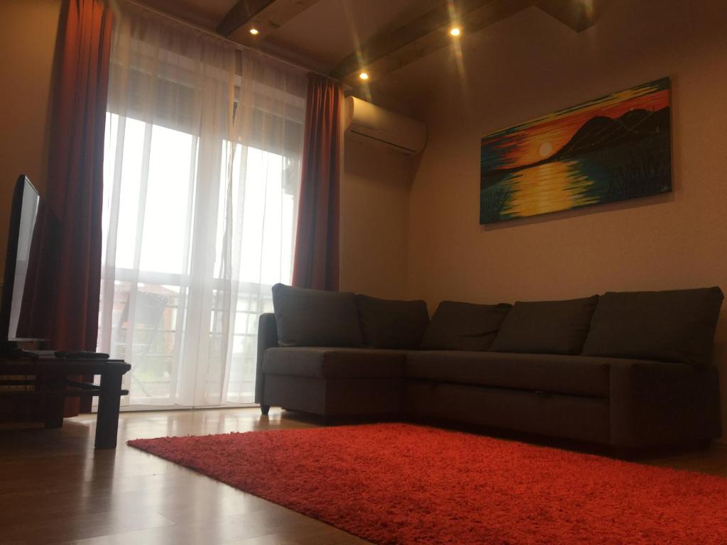 Posezení v ubytování Tulipán Apartman Kápolnásnyék