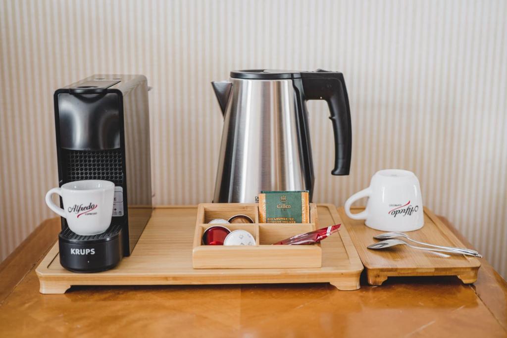 Příslušenství pro přípravu čaje a kávy v ubytování Hotel Solaris