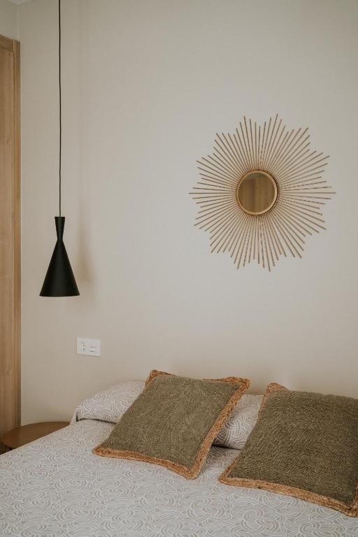 Posteľ alebo postele v izbe v ubytovaní Apartamentos Levante - Mares